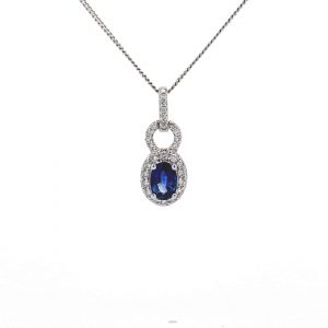 0.90ct Sapphire and 0.26ct Diamond Oval Halo Pendant in 18ct White Gold with 16 Inch Chain