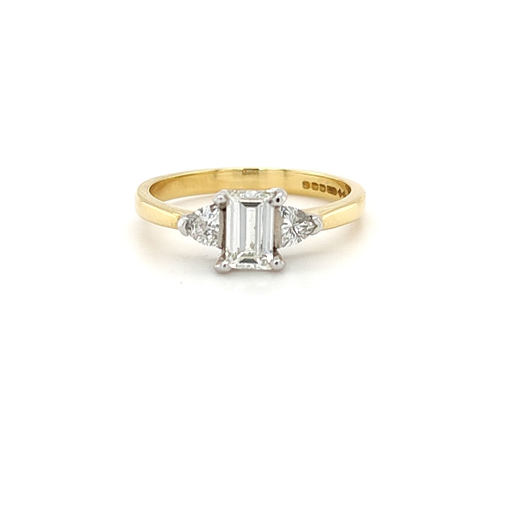 0.60ct, Emerald Cut Diamond with Trilliant Cut Shoulders in 18ct Gold