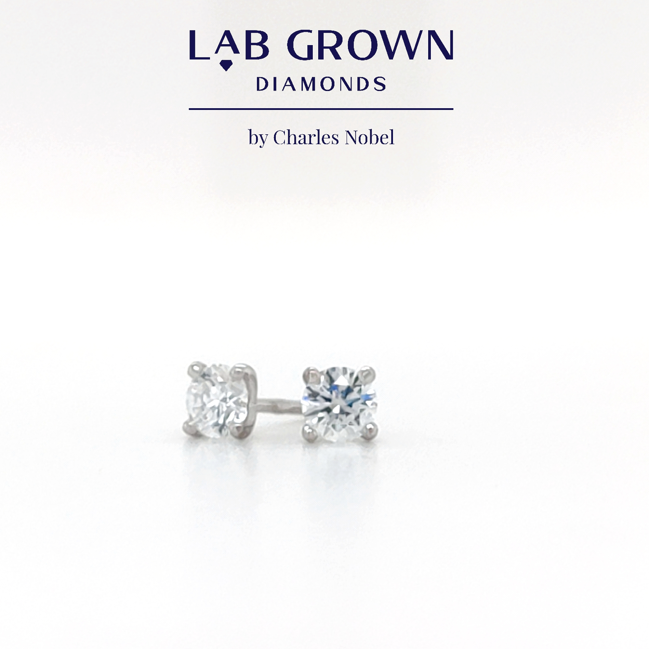 0.60ct, D Colour, VVS2 Clarity Lab Grown Diamond Solitaire Earrings – Top Colour