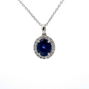 1.23ct Sapphire and 0.18ct Diamond Oval Cluster Pendant in 18ct White Gold - 16 Inch Chain