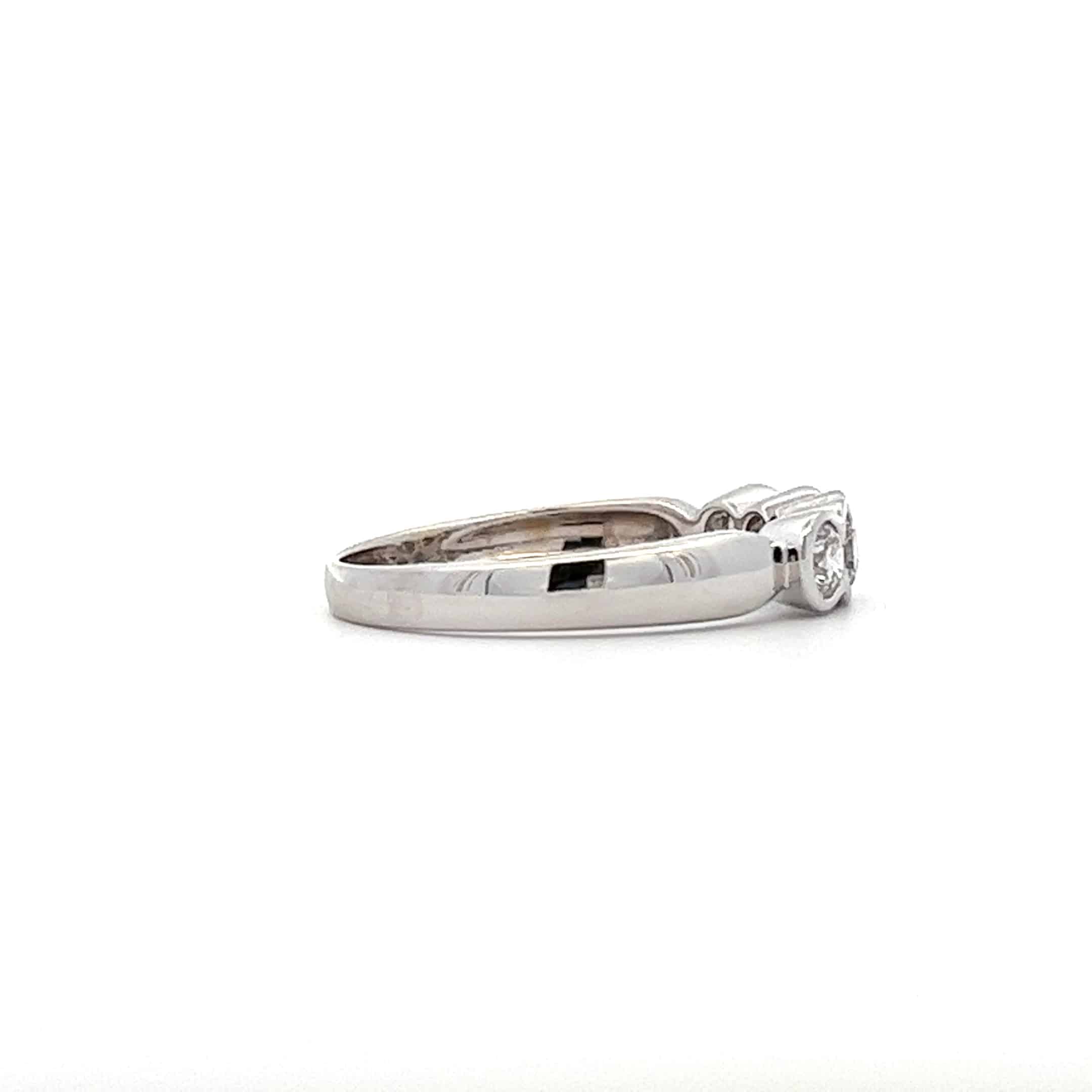 0.50ct 18ct White Gold 5 Stone Rub-over Ring