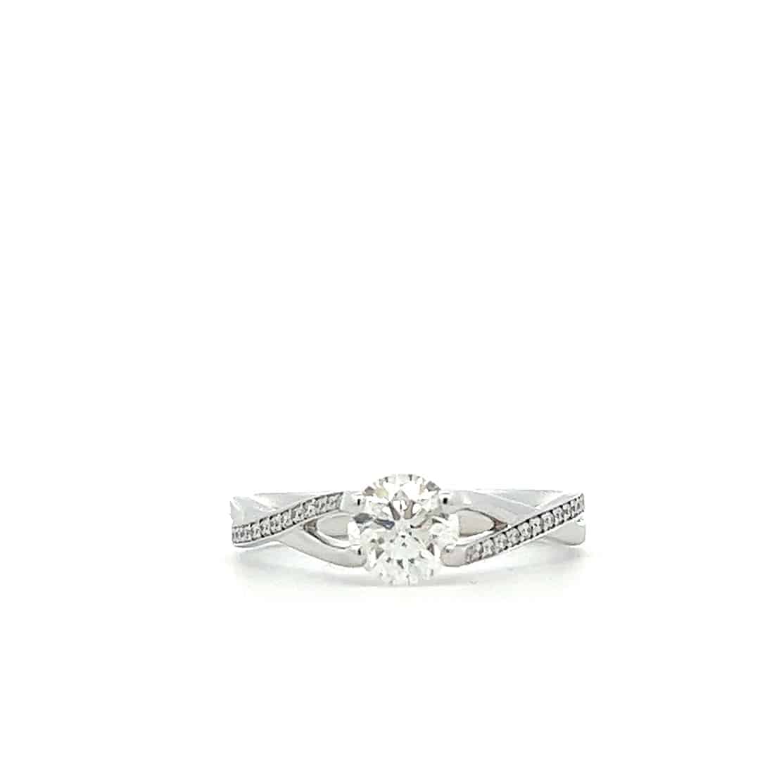 0.62ct Brilliant Cut Diamond set in an 18ct White Gold Wave Design Ring
