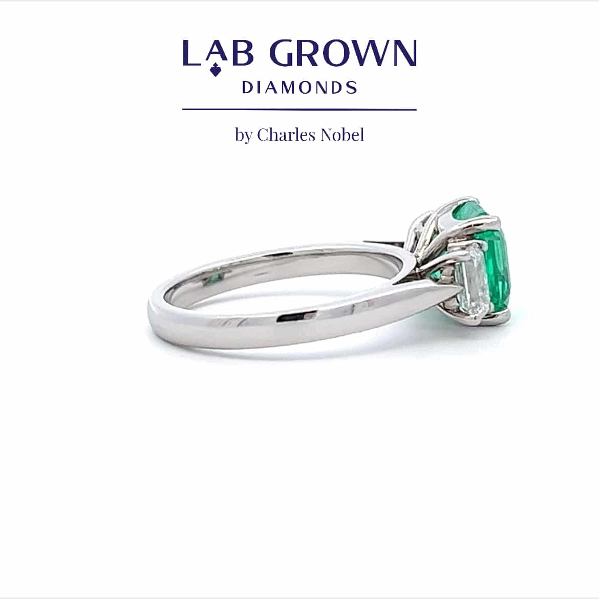2.20ct Lab Grown Emerald and 0.83ct Lab Grown Diamond Trilogy Design Ring in Platinum