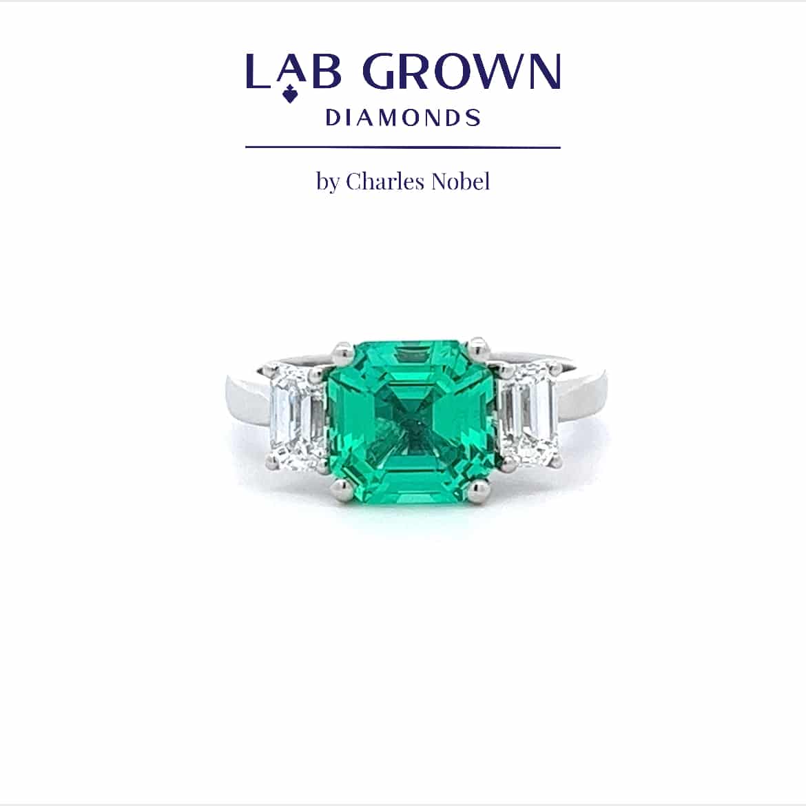 2.20ct Lab Grown Emerald and 0.83ct Lab Grown Diamond Trilogy Design Ring in Platinum