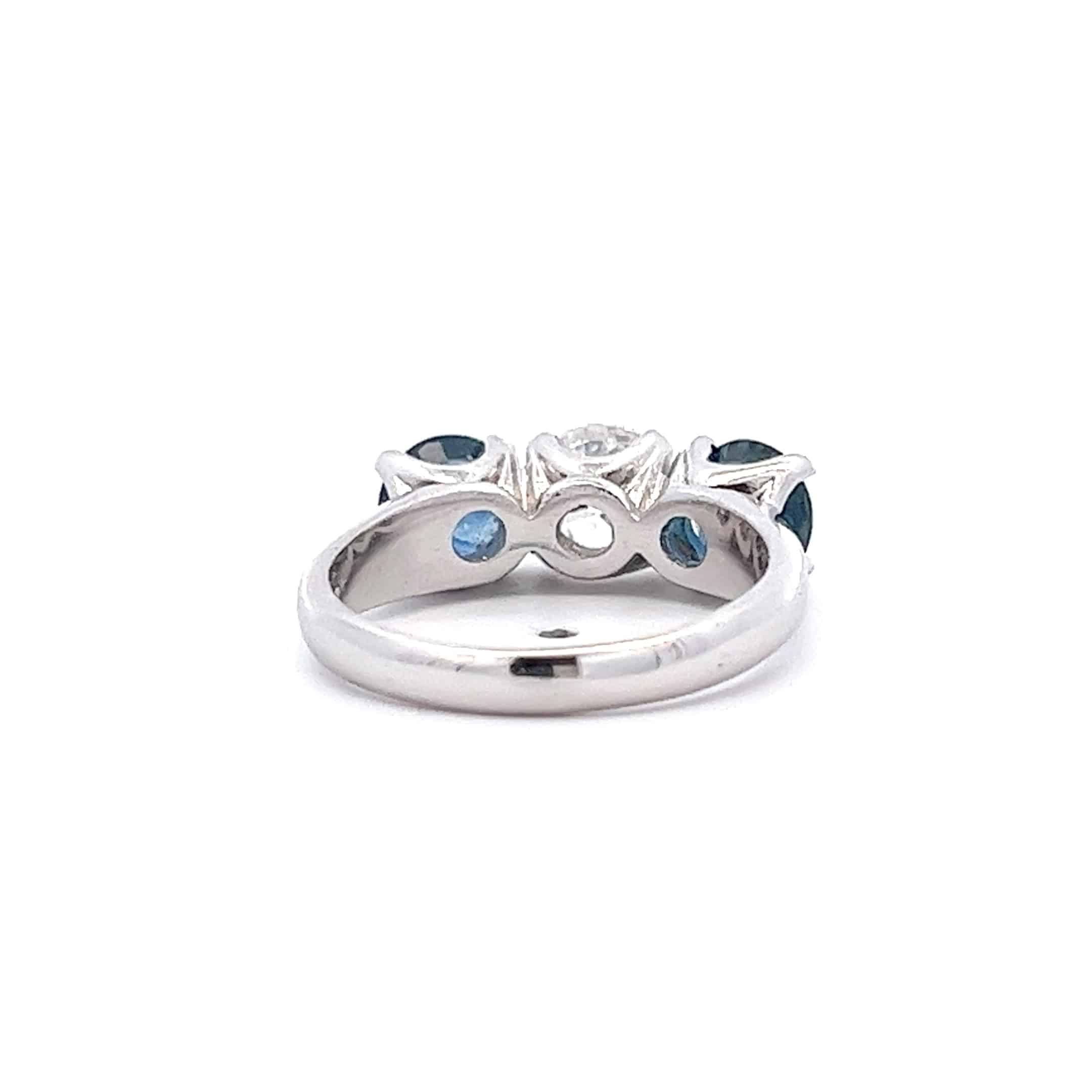 1ct Brilliant Cut Diamond set with Two Sapphire in Four Claw Settings mounted in 18ct White Gold – Pre-Owned