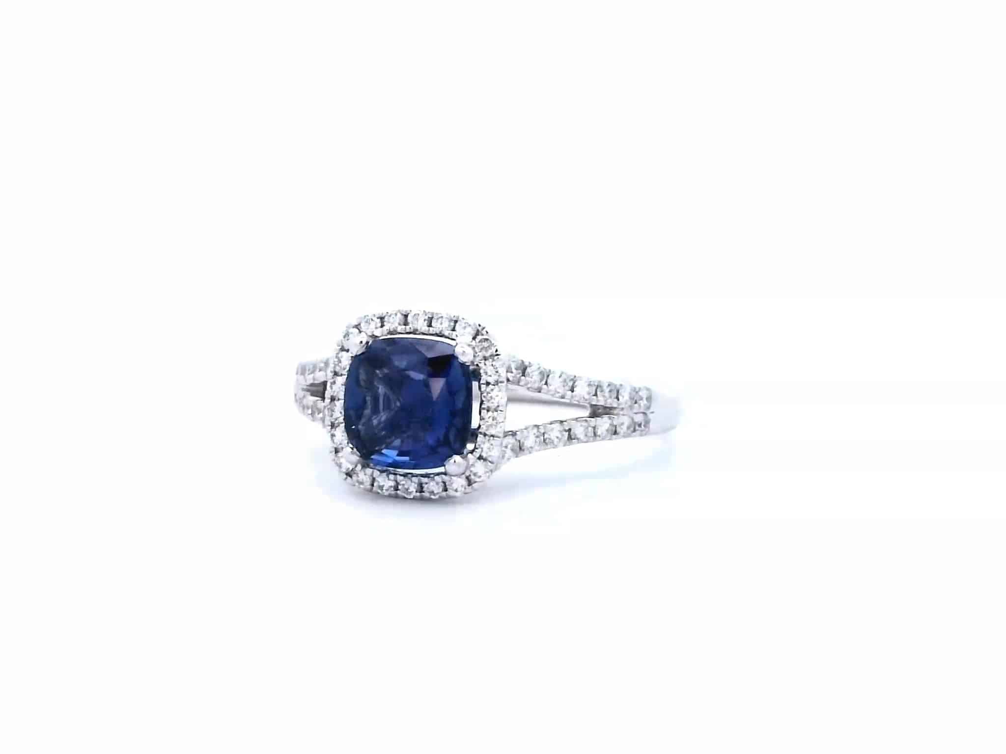 1.15ct Sapphire and Diamond Halo Design Ring set in 18ct White Gold