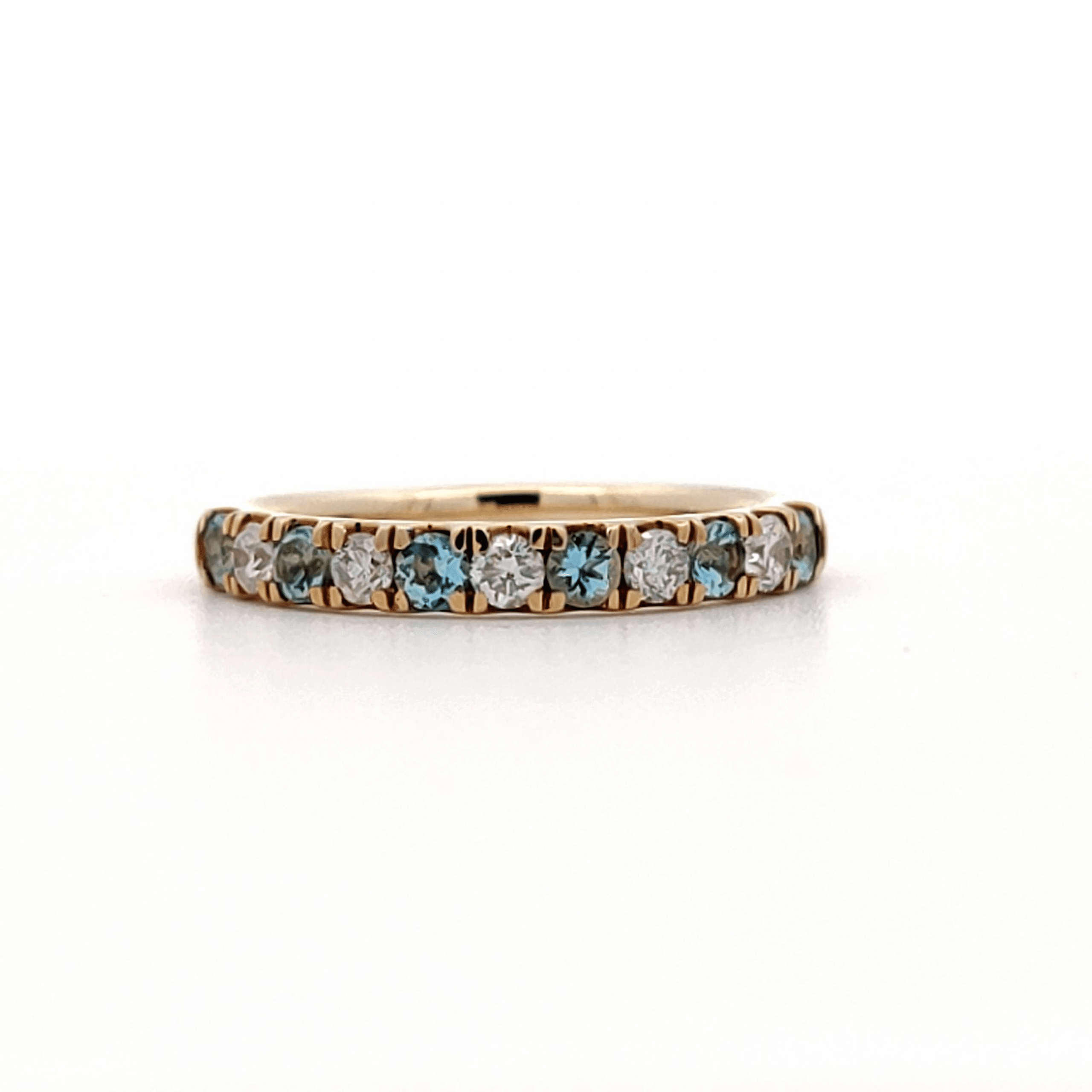 0.37ct Blue Topaz and 0.29ct Diamond Ring set in Yellow Gold