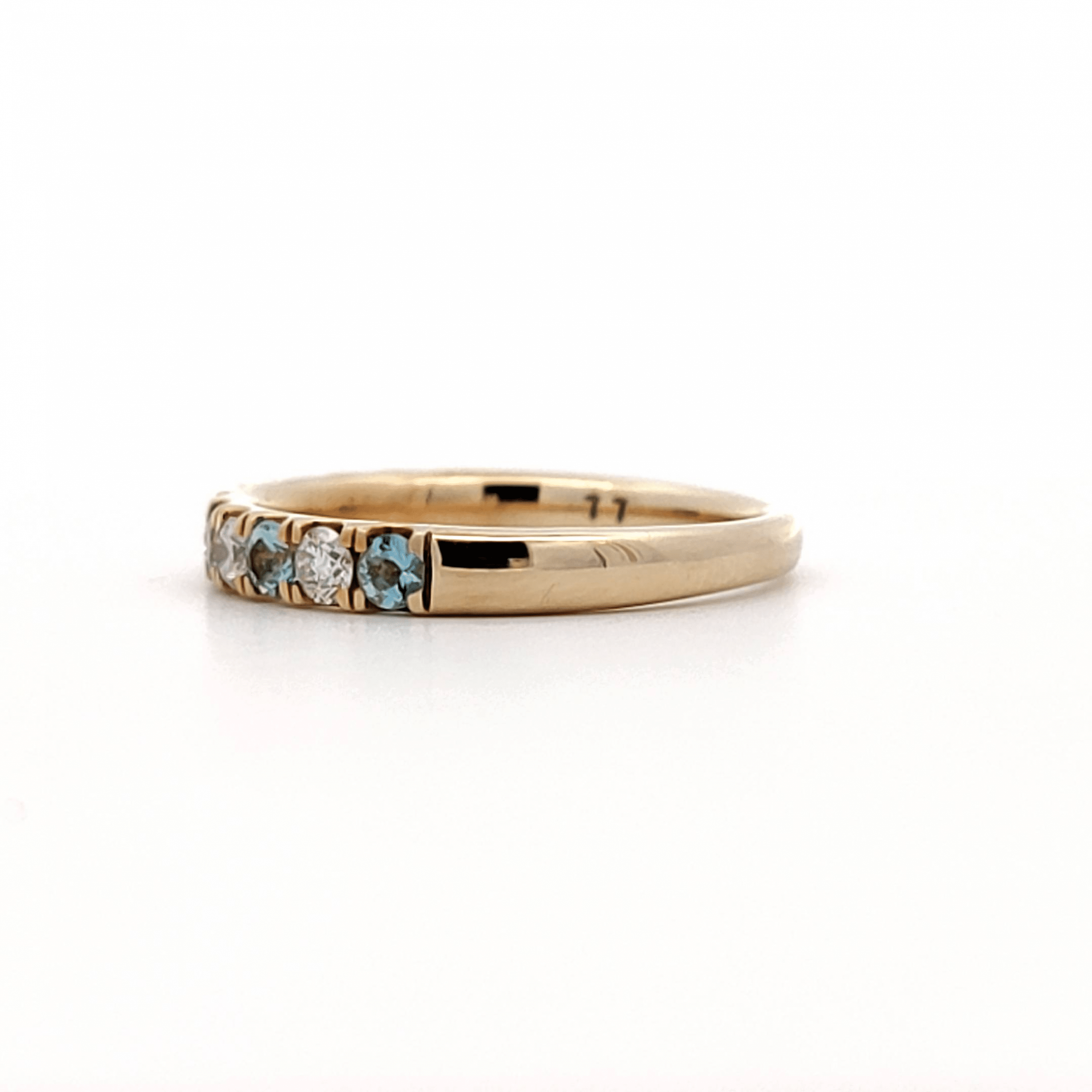 0.37ct Blue Topaz and 0.29ct Diamond Ring set in Yellow Gold